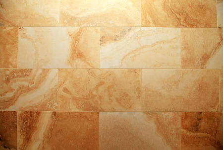 beige marble tile texture abstract backgroundの写真素材