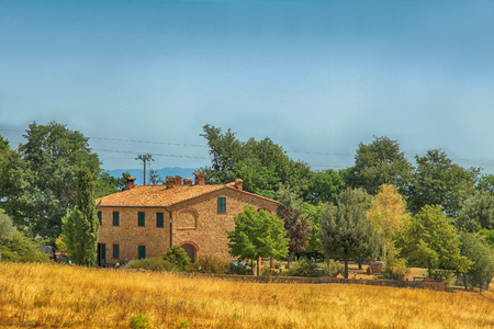 Idyllic rural Tuscan landscape with farmhouse, Italy, Europeの写真素材