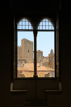 antique old window with view of roof in medieval town, Italy. Selective focusの写真素材