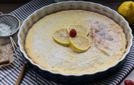 Homemade cheesecake with raspberries and lemon. Delicate dessert for coffeeの写真素材