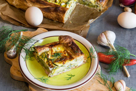 Great homemade baked zucchini cake with dill and sour creamの写真素材