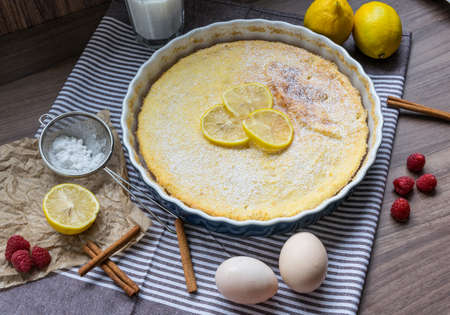 Homemade cheesecake with raspberries and lemon. Delicate dessert for coffeeの写真素材