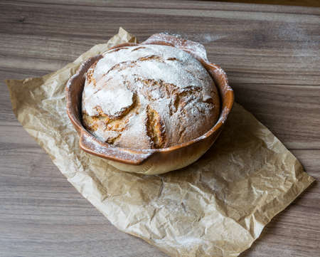 Excellent crunchy homemade bread baked in a baking dishの写真素材