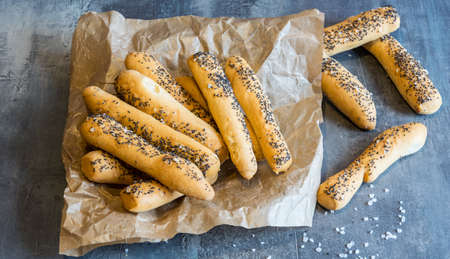 Home made salty pastry with salt and poppy seeds. Excellent as a complement to beerの写真素材