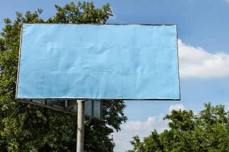 Blank billboard on sky backgroundの写真素材