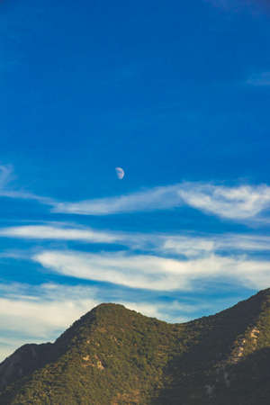A trip to the tourist old town of the Adriatic coast Perast in Montenegro among the mountains and with beautiful old buildings with red tiles, there are many cafes in the city, narrow streets and clean air with seagulls and catsの写真素材