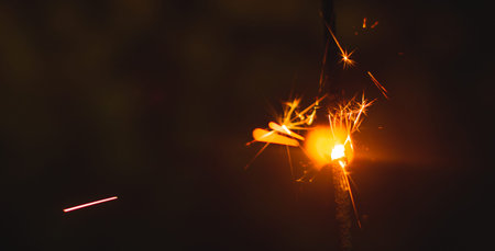 A series of photographs for the holiday New Years and Christmas sparklers on a bright beautiful...