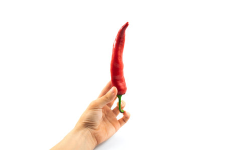 Series of photos of red hot chili peppers on white isolated background with empty space and with...