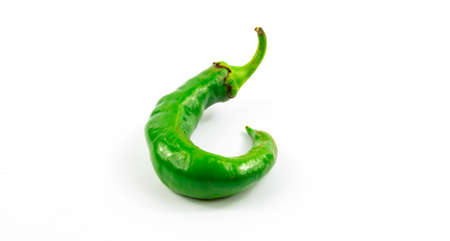 Series of photos of red hot chili peppers on white isolated background with empty space and with greens, composition banner for website and menuの写真素材