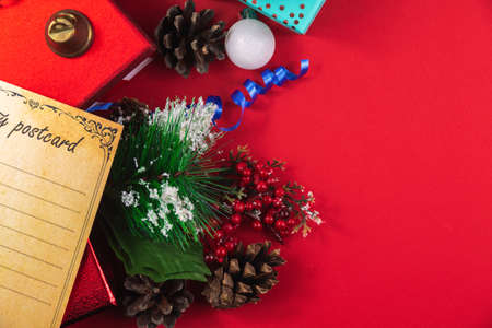 A series of very cozy New Year compositions and backgrounds on red, banners and wishes for a Happy New Year, decorations and gift boxes, postcardsの写真素材