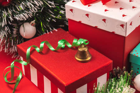 A series of very cozy New Year compositions and backgrounds on red, banners and wishes for a Happy New Year, decorations and gift boxes, postcardsの写真素材