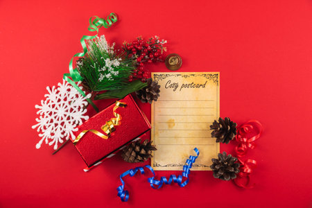 A series of very cozy New Year compositions and backgrounds on red, banners and wishes for a Happy New Year, decorations and gift boxes, postcardsの写真素材