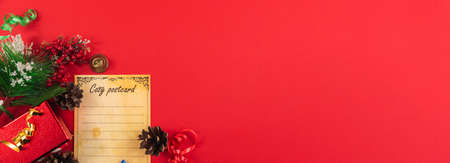 A series of very cozy New Year compositions and backgrounds on red, banners and wishes for a Happy New Year, decorations and gift boxes, postcardsの写真素材