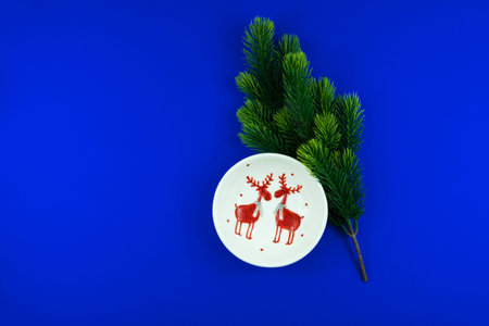 New Year and Christmas attributes and decorations on a beautiful blue background, top view, template