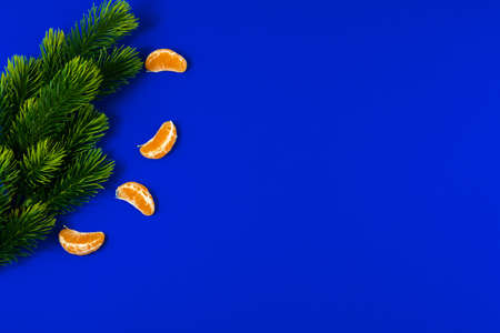 New Year and Christmas attributes and decorations on a beautiful blue background, top view, templateの写真素材