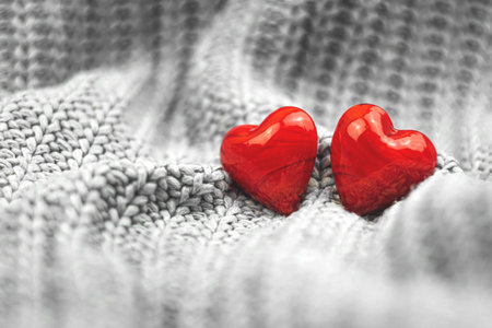 Valentine's Day two red hearts background, couple, greeting card and concept of love, blurred, copy...