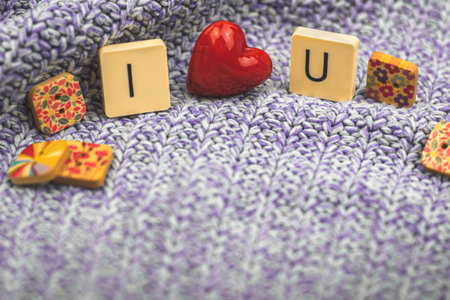 Valentine's day composition, i love you made with cubes and red glass heart, holiday decoration,...