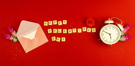 Valentine's day greeting card concept, envelop and morning alarm clock, love theme, word on cubes,...