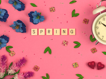 Spring flat lay background, lettering, beauty and decorative flowers, accessories. High quality photoの写真素材