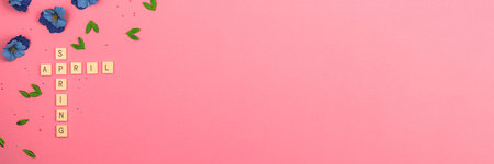 April month lettering flat lay concept, spring background, top view, pink colors and decorative...