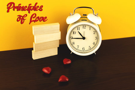 Principles of love conceptual photo banner with copy space, place for text and red hearts, wooden...