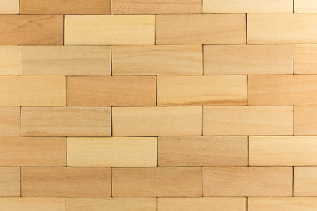 Wooden wall from block stacks, wooden pegs texture photo