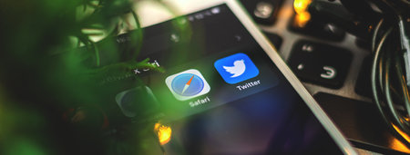 Kharkov, Ukraine - 26 January, 2021: twitter and safari application on Apple iPhone, creative close up banner, workplace and copy space photoのeditorial素材