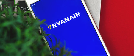 Kharkov, Ukraine - 26 January, 2021: close up of airline Ryanair application with on a Apple iPhone, flat lay banner, copy space, template and workplace photoのeditorial素材