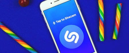 Kharkov, Ukraine - February 5, 2021: close up of Shazam application on Apple smartphone, searching...