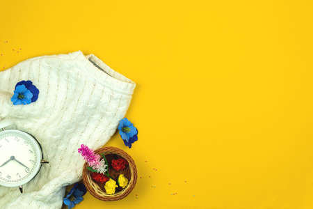 Spring festive desk composition and yellow colorful background, copy space photoの写真素材