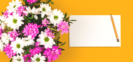 Spring mockup with bouquet of flowers, women's day or mother's day template or layour design with blank paper, copy space photoの写真素材