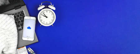 Kharkov, Ukraine - February 22, 2021: Microsoft OneDrive application icon on Apple iPhone screen, cloud storage creative concept, flat lay banner background, copy spaceのeditorial素材