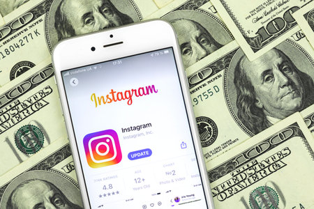 Kharkov, Ukraine - February 22, 2021: Instagram app logo on Apple iPhone screen, background of the...