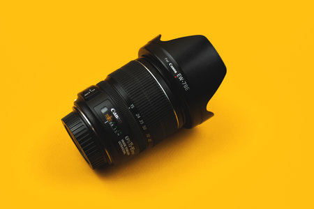Kharkov, Ukraine - March 7, 2021: Canon 15-85mm kit and universal lens with logos and lens hoodのeditorial素材