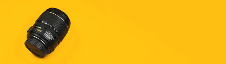 Kharkov, Ukraine - March 7, 2021: Canon equipment banner with copy space, camera lens photoのeditorial素材