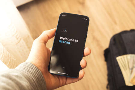 Kharkov, Ukraine - March 9, 2021: Stocks app on Apple iPhone, trading concept, hedge funds, corp stock index etc.のeditorial素材