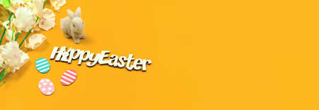Happy easter congratulation banner with easter decoration, flat lay composition, copy space photoの写真素材