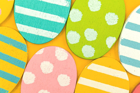 Easter eggs background, flat lay styled image with painted egg
