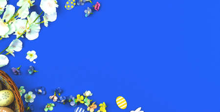 Easter border frame composition with easter painted eggs and flowers, banner with blue background, top view and copy space photoの写真素材