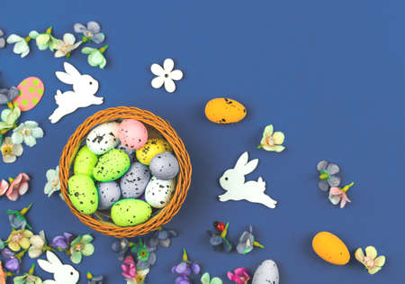 Easter bakcground with egg nest and easter cute bunny, spring flower greeting card conceptの写真素材