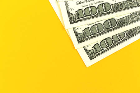 One hundred US dollars background on office desk, copy space photoの写真素材