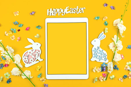 Happy Easter template, mockup on yellow background with modern frame for your textの写真素材