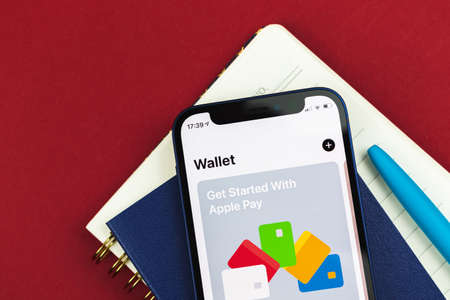 Kharkov, Ukraine - March 10, 2021: Aplle Wallet app, Apple Pay service backgroundのeditorial素材