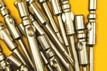 Lot of metal replaceable bits for screwdriver background photo