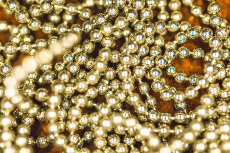 Shiny Golden beads background and close up
