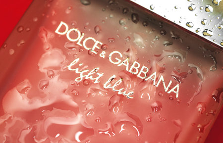 Kharkov, Ukraine - March 23, 2021: Dolce Gabana perfume logo with droplets, close-up