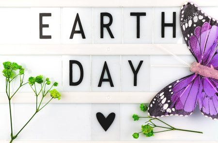 Earth Day text message background, celebration greeting card with lettering