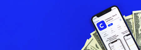 Kharkov, Ukraine - April 9, 2021: Coinbase Bitcoin crypto currency mbile app on the Apple iPhone screen, banner with copy spaceのeditorial素材