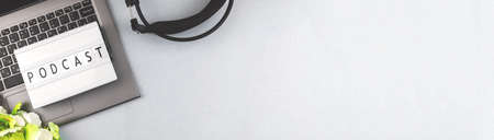 Podcast flat lay concept banner with word on the lightbox, copy space photoの写真素材