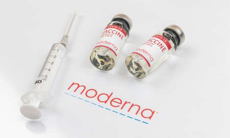 Kharkov, Ukraine - April 18, 2021: Moderna vaccine vial with syringe, vaccination COVID-19 concept photoのeditorial素材